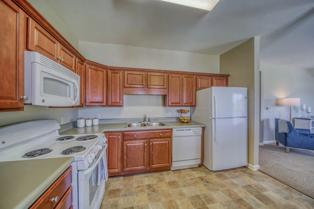 Kitchen area with view of open living room
