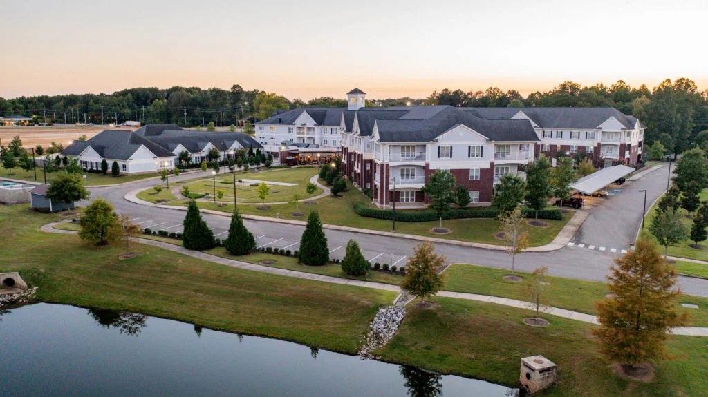 Heritage at Irene Woods exterior, view of pond, aerial view