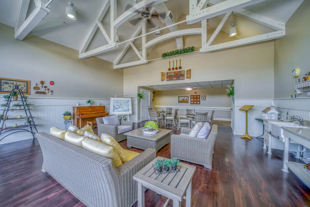 large room with high ceilings, and comfortable chairs
