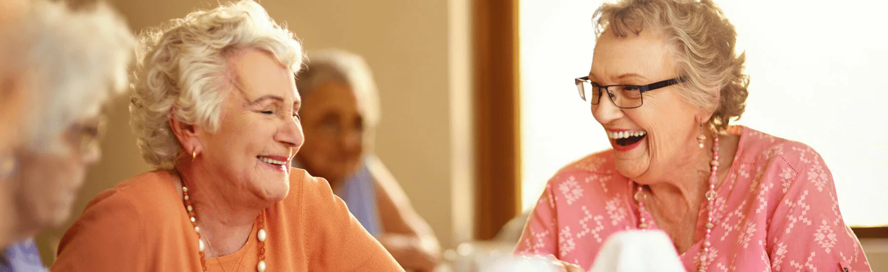 Senior women laughing
